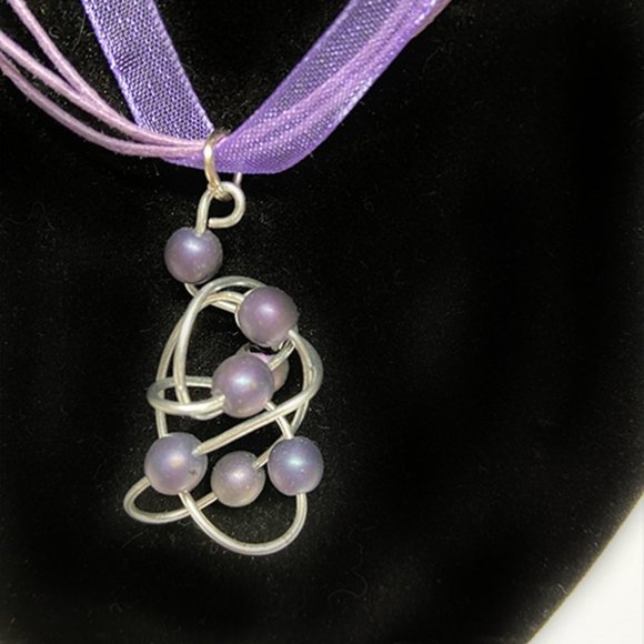 Stainless Steel Twisted Pendant with Druk Beads Handcrafted by Artisan - Picture 1 of 9